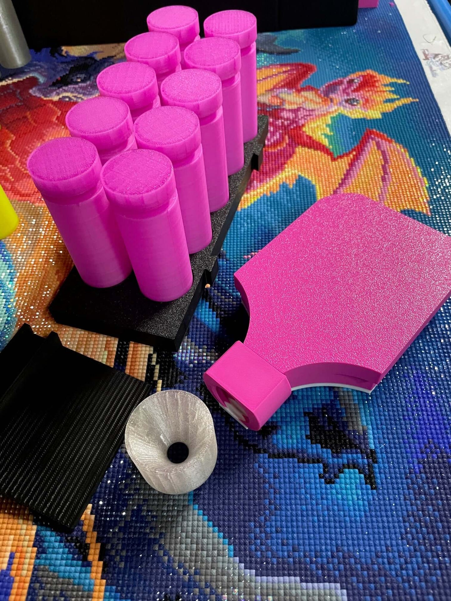 Pink Mist Screw & Shake Starter Kit with containers, upright stand, and funnel on a colorful background.