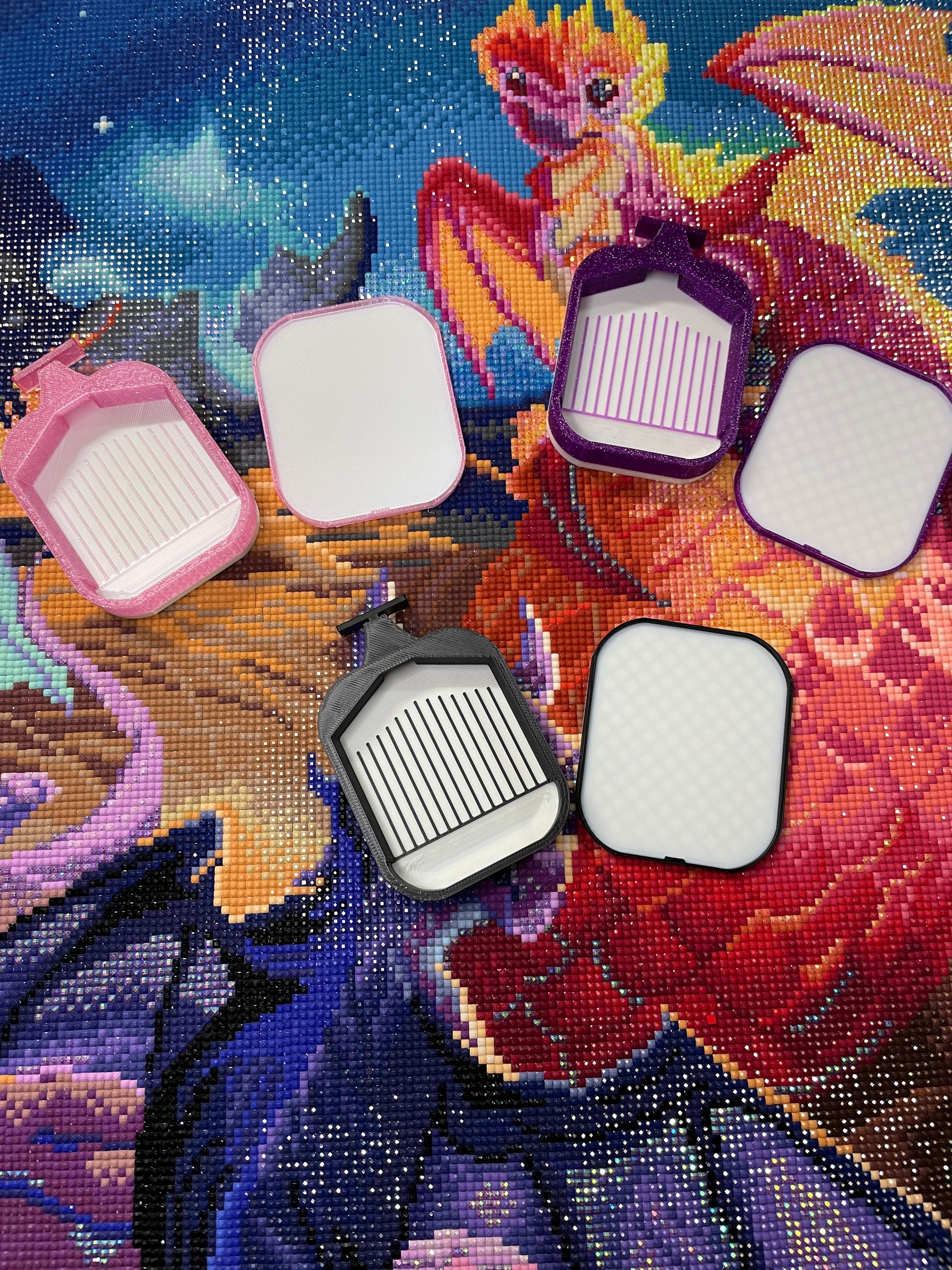 Deluxe 2 Phoenix Small Diamond Painting Trays in various colors with white base, displayed on dragon-themed background.