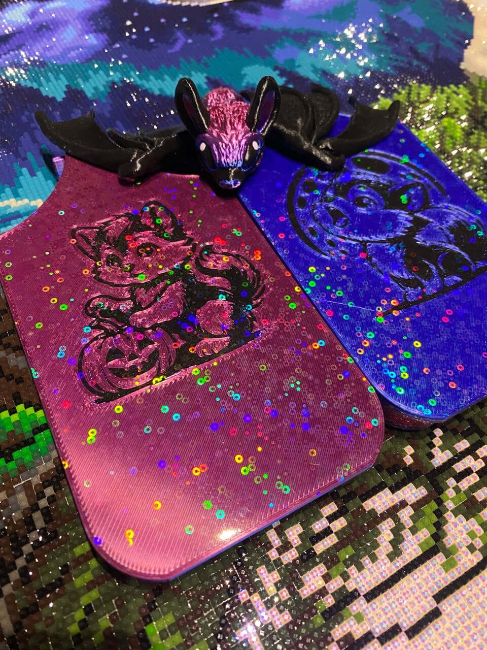 Halloween-themed dragon trays with werewolf designs and a vampire bat painting buddy on a sparkly background.