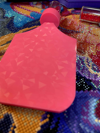 Pink Dragonling Screw & Shake Diamond Art Tray on colorful background with drill container attachment.