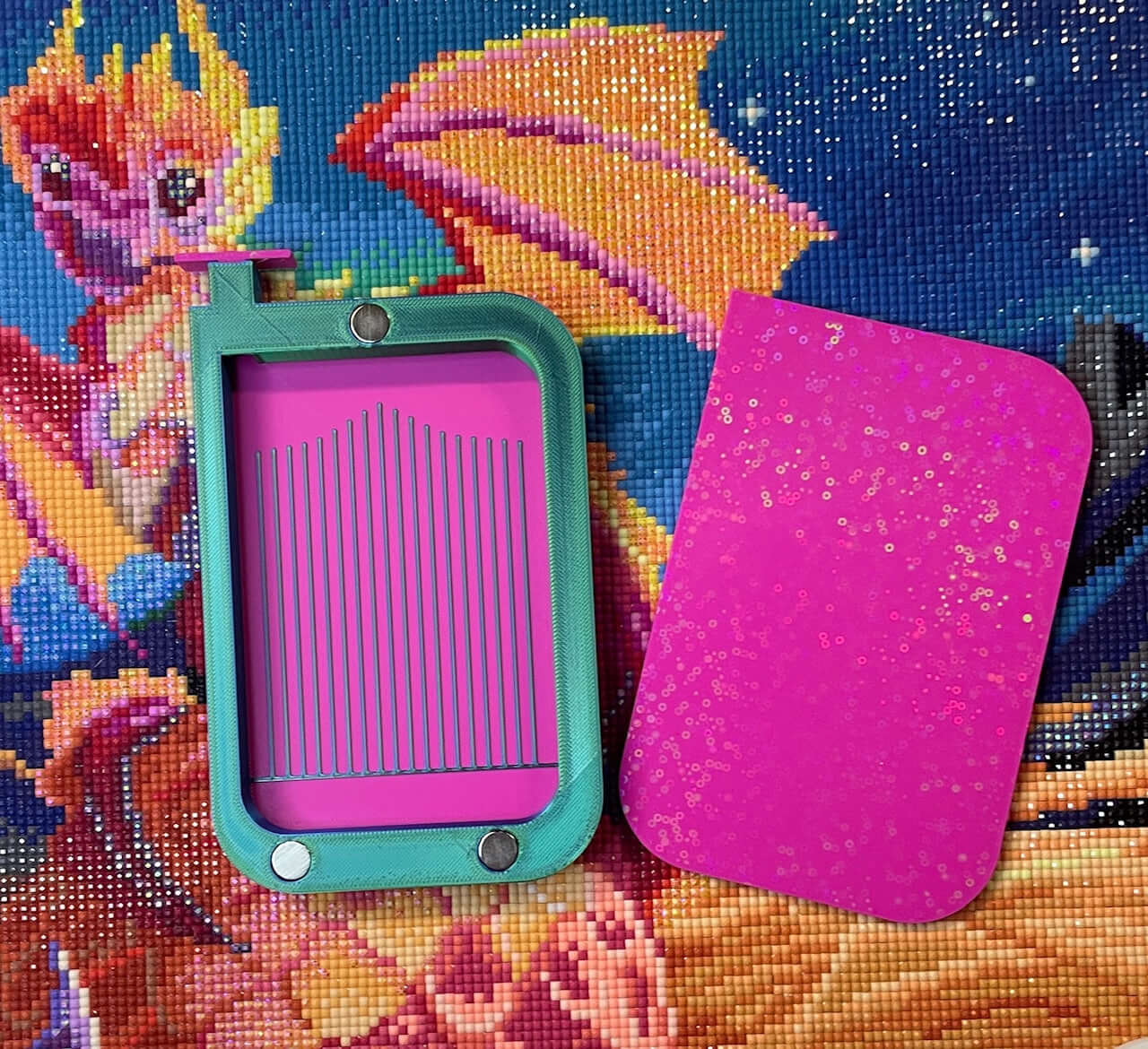 Magnetsaurus diamond art tray with magnetic lid and stopper on colorful dragon design background.