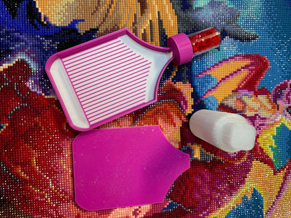 Dragonling Screw & Shake White Belly Diamond Art Tray with pink edge on colorful canvas background.